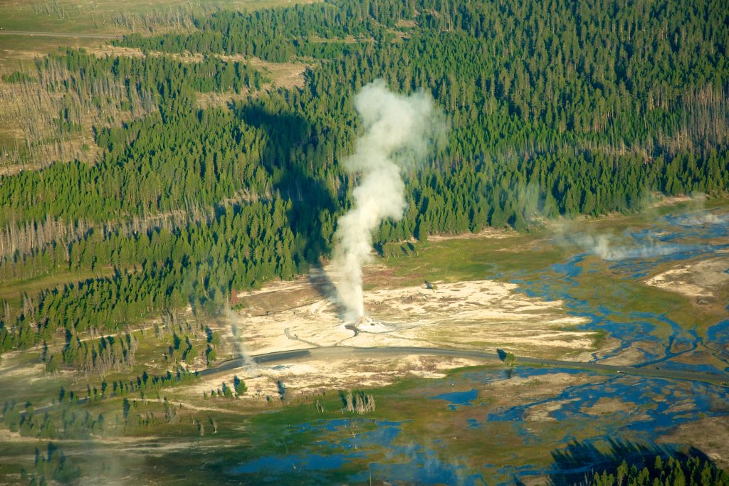 Overhead of geyser erupting at Yellowstone National Park